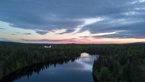 istock Aerial Nature Landscape Flying over River at Sunset 692667276