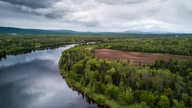 istock Aerial Nature Landscape Flying over River on Cloudy day 692667310