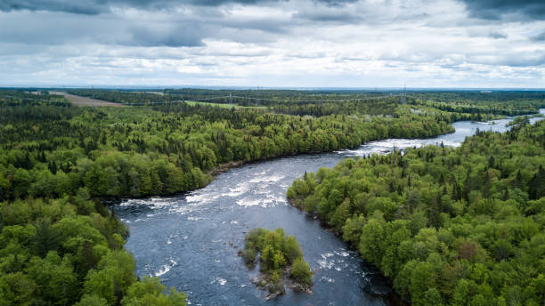 istock Aerial Nature Landscape Flying over River on Cloudy day 692667312