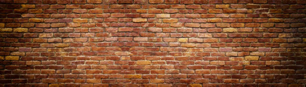 istock panoramic view of masonry, brick wall as background 692667424