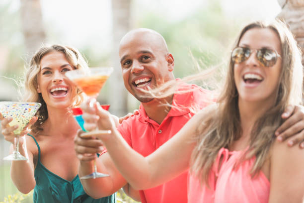 Friends at a party drinking cocktails