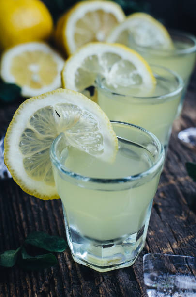 istock Italian traditional liqueur limoncello with lemon 692670636