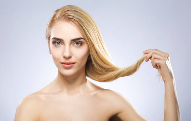 istock Cute girl with nude make up at studio 692687158