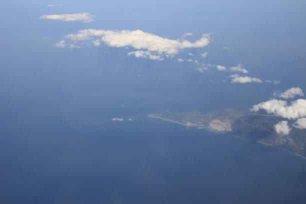 istock View of the land, fields, and clouds from above 692688020