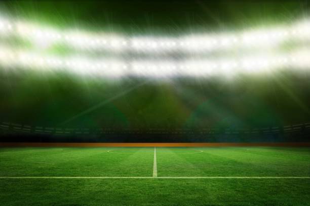 istock Football pitch under green lights 692688144