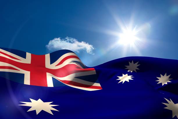 istock Australian national flag under sunny sky 692690890