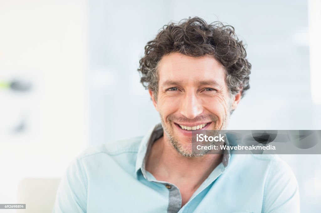 Portrait of casual businessman Portrait of casual businessman in the office Men Stock Photo