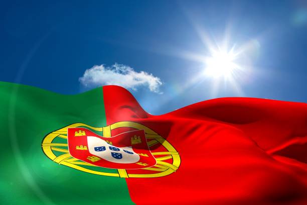 istock Portugal national flag under sunny sky 692702048