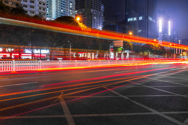 istock traffic light trails at night in Shanghai 692702452