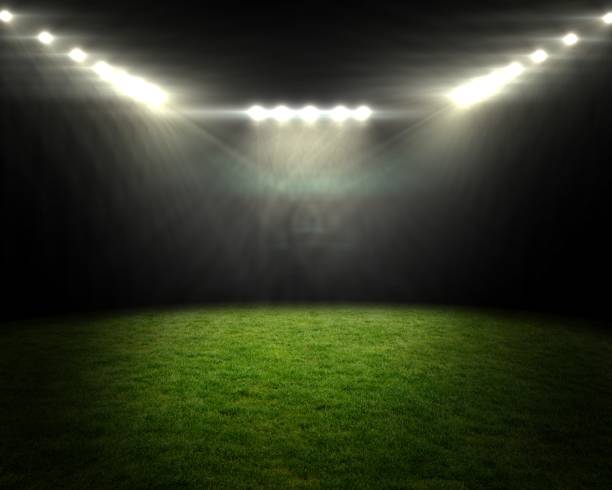 istock Football pitch under bright spotlights 692704944
