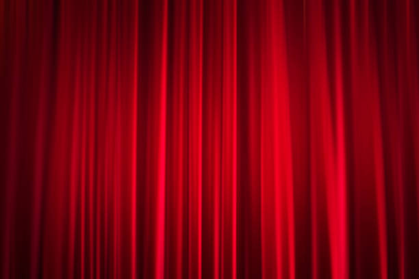 istock Defocused view of red cinema curtain 692714934
