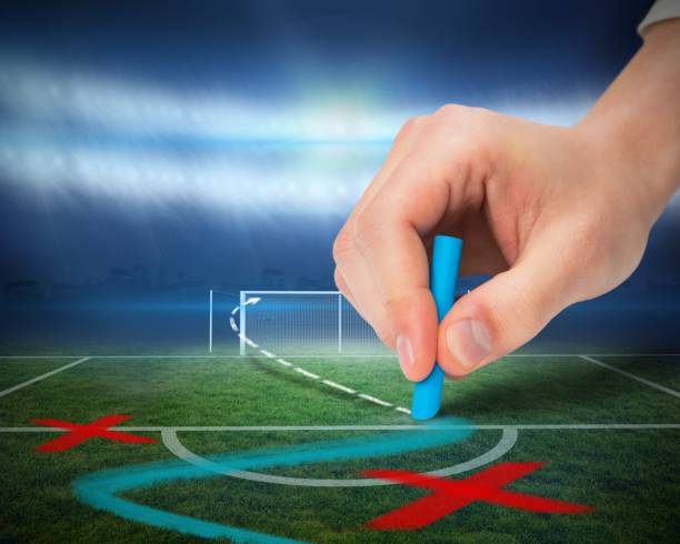 istock Hand drawing tactics on football pitch 692717198