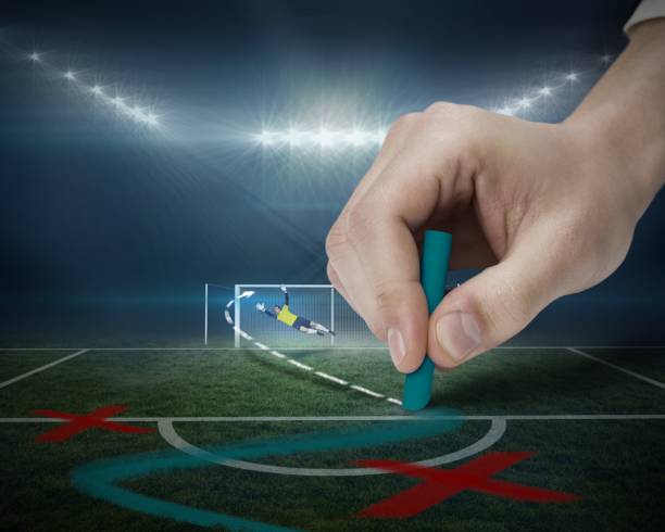 istock Hand drawing tactics on football pitch 692717236