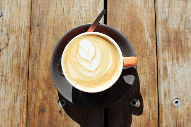 istock Fresh hot coffee on a wooden table 692731136