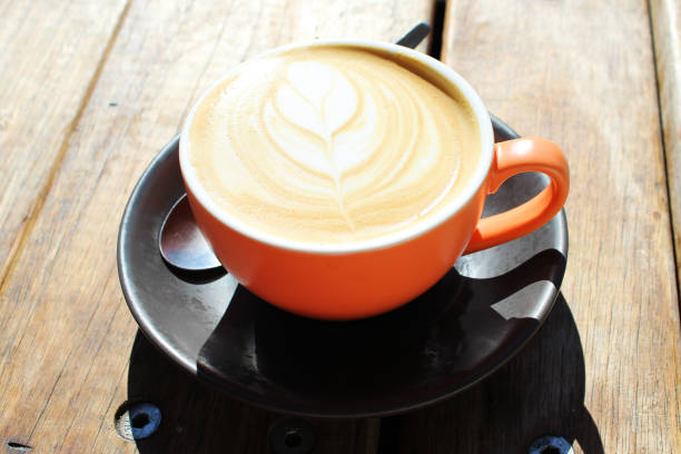 istock Fresh hot coffee on a wooden table 692731218