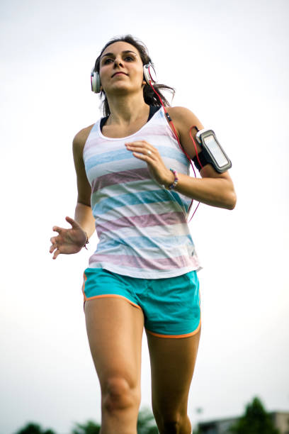 istock Young sporty girl running 692732482