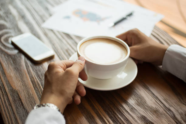 istock Businessman working and drinking coffee 692732554
