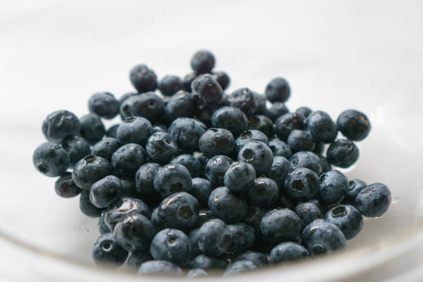 istock Organic Blueberries in a Clear Bowl 692734636