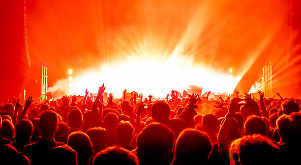 istock Crowd At Music Concert Against Sky 692740585