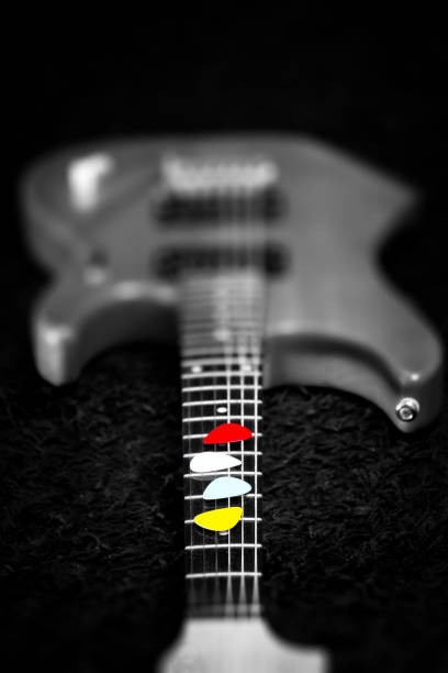 istock colourful picks on electric guitar fingerboard 692765144