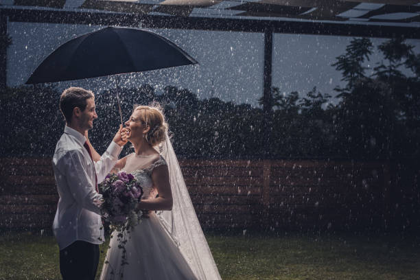 istock Even heavy rain can't ruin our love! 692765274