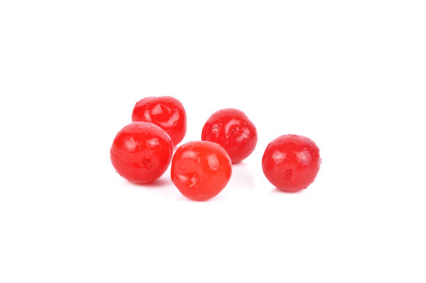istock Maraschino cherries on white background 692767666