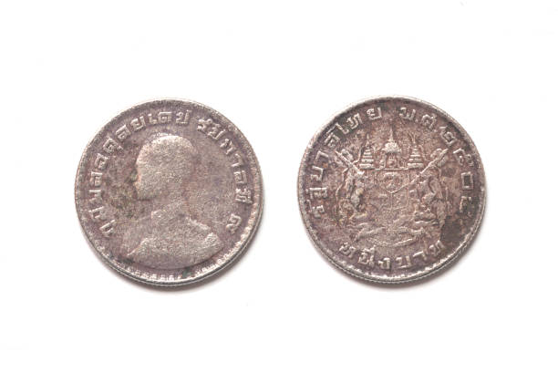 istock isolated of 1962 old Thai coin on white background 692768100