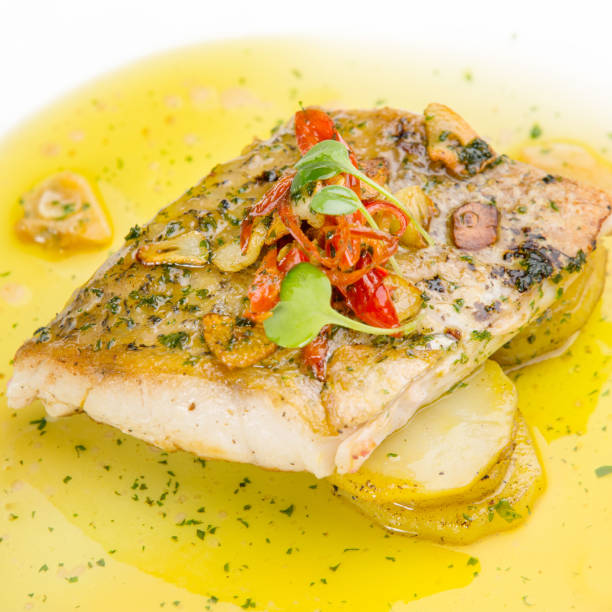 Fish fillet in butter lemon sauce