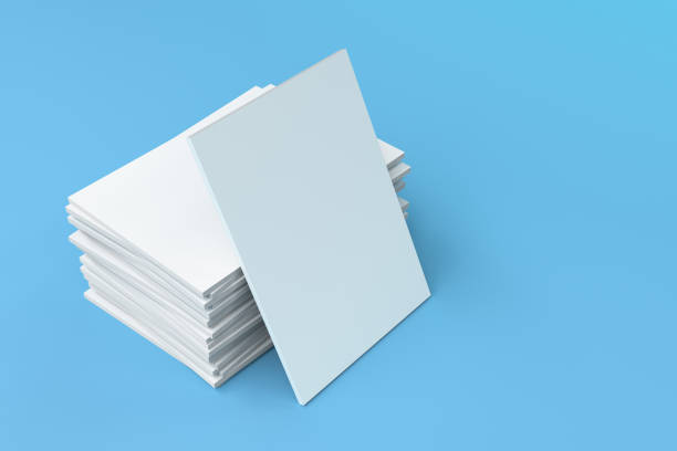 istock Stack of blank white closed brochure mock-up on blue background 692775092