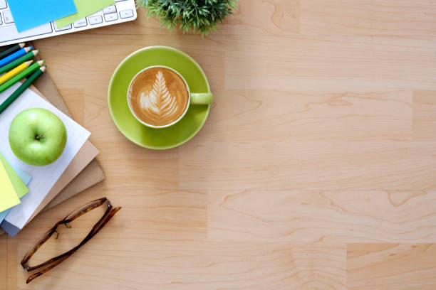 istock Desktop with business objects and snack foods. 692779236