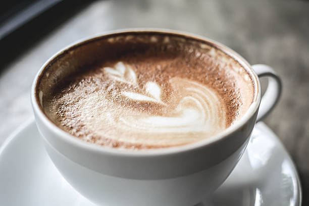 istock Close-Up Of Cappuccino On Table 692779299