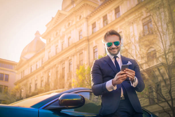 istock Businessman by his car 692786948