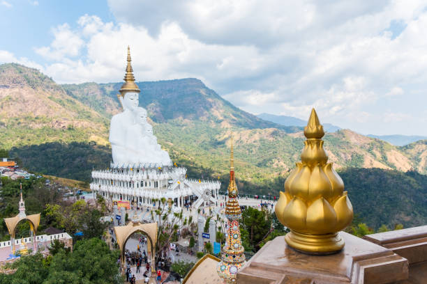 istock Five sitting Buddha statues at Wat Pha Sorn Kaew 692790022