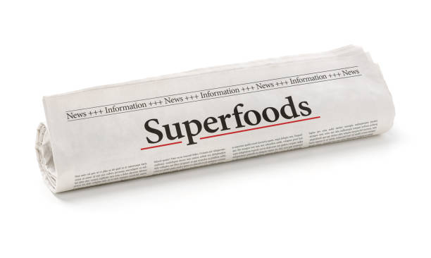 istock Rolled newspaper with the headline Superfoods 692790624