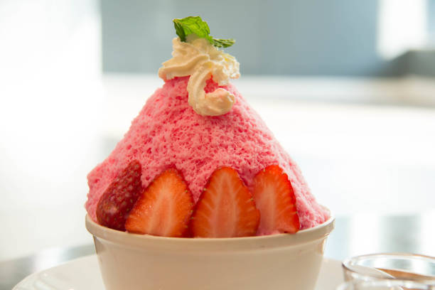 strawberry bingsu and cream ontop korean dessert