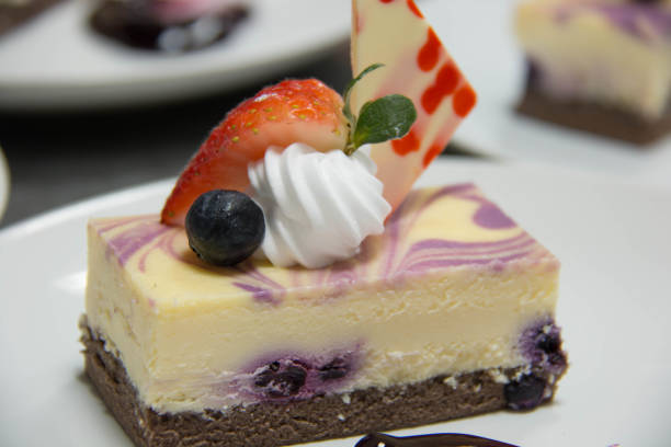 istock Blueberry cheese cake decorated with strawberry 692797864