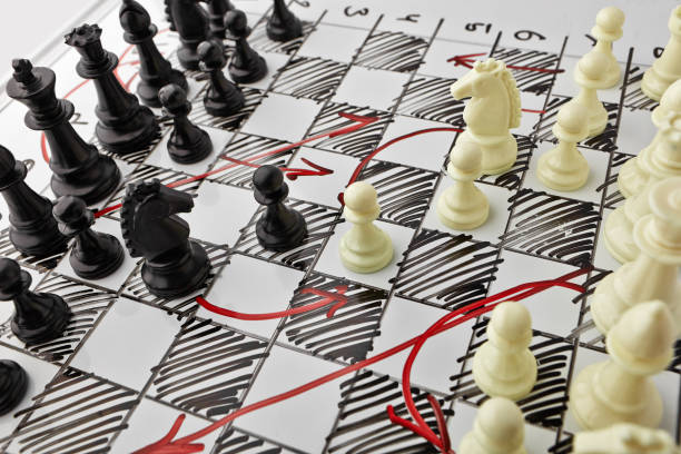 istock Chess. White board with chess figures on it. Plan of battle. 692798074