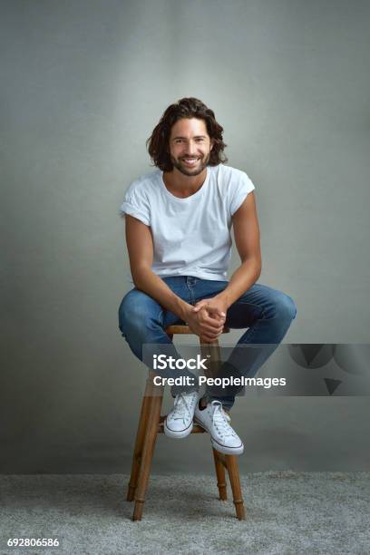 Im Just An Easygoing Kinda Guy Stock Photo - Download Image Now - Men, Sitting, Stool