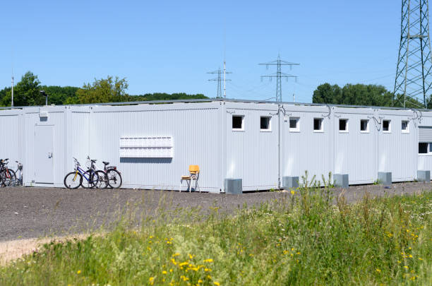 istock Prefabricated metal housing for workmen on site 692811824