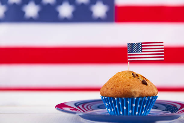 istock Cute cupcake with american flag 692811868