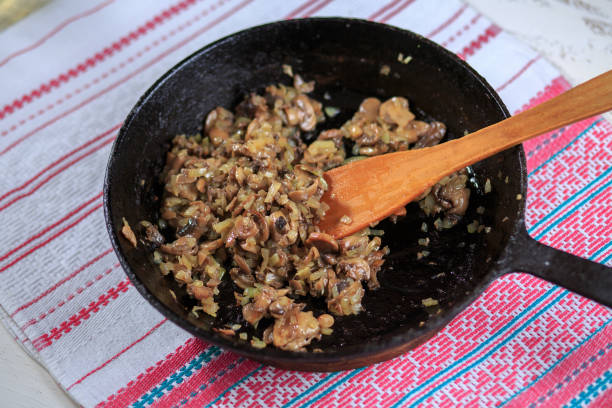 istock Fried mushrooms with onions 692811980