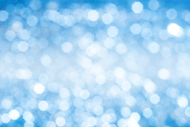 istock Abstract blue glitter bokeh. concept christmas and new year for background. 692812514