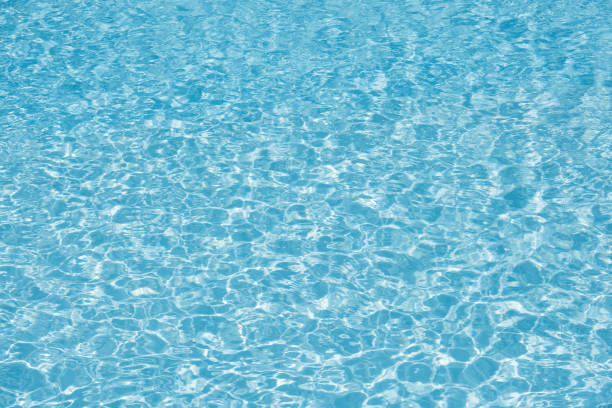 istock Beautiful ripple water surface in pool for background 692814208