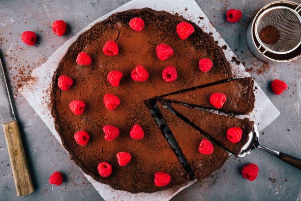 istock Chocolate tart with raspberries 692818884