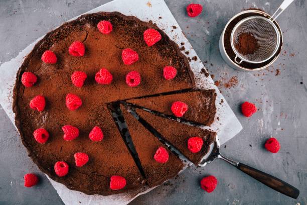 istock Chocolate tart with raspberries 692818994