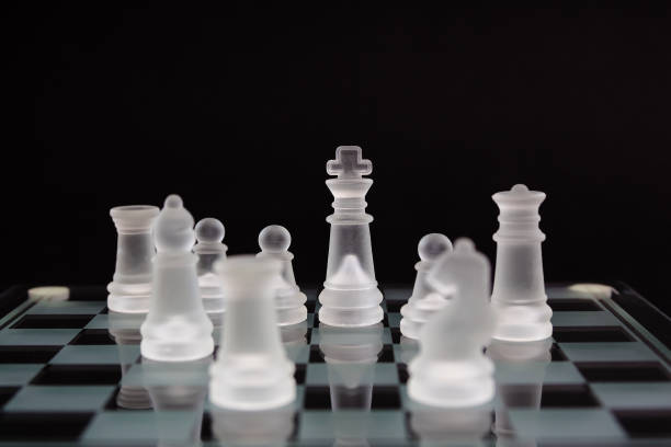 istock Glass Chess on a black background. Minimum business concept. 692823580
