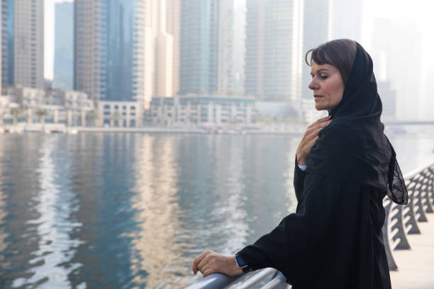 istock Woman in an abaya on a boardwalk. 692826174