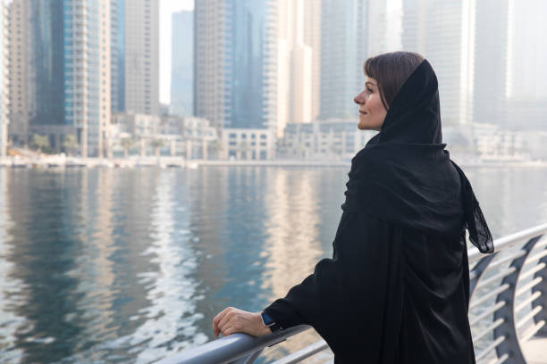 istock Woman in an abaya on a boardwalk. 692826178