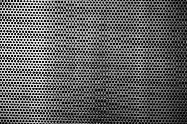 istock Metal texture grey small holes 692826900