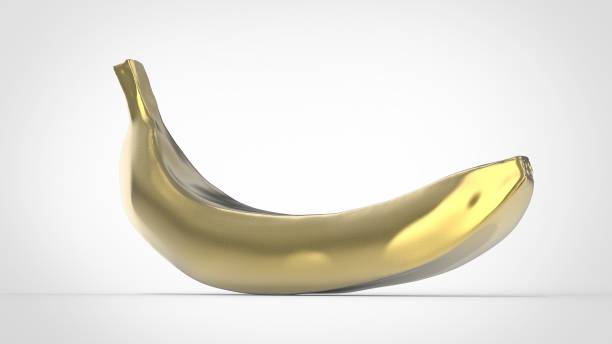 istock Golden banana isolated on white 692834838
